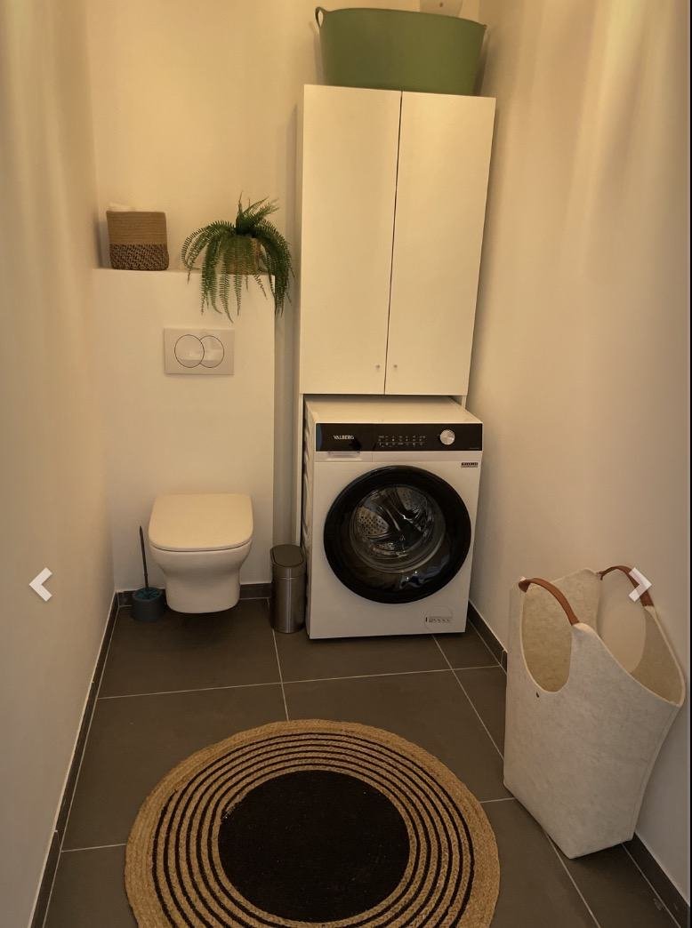 WC séparés et espace buanderie